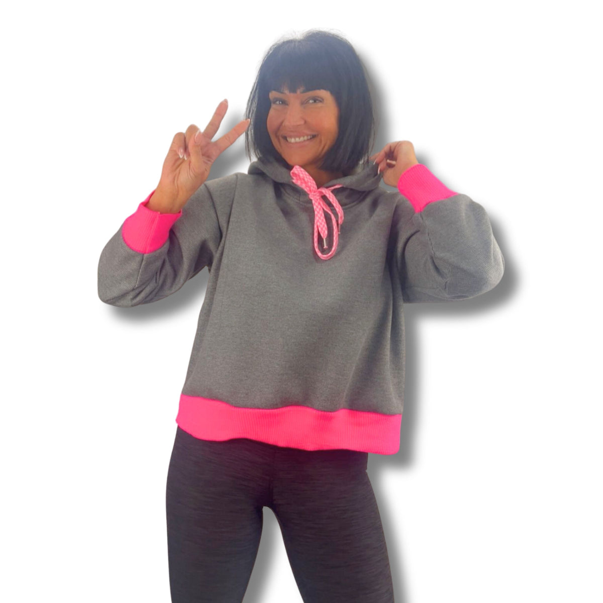 Lässiger Hoodie mit pinken Akzenten in Beige – bequemer Oversize-Hoodie von Schenkt ein Herz