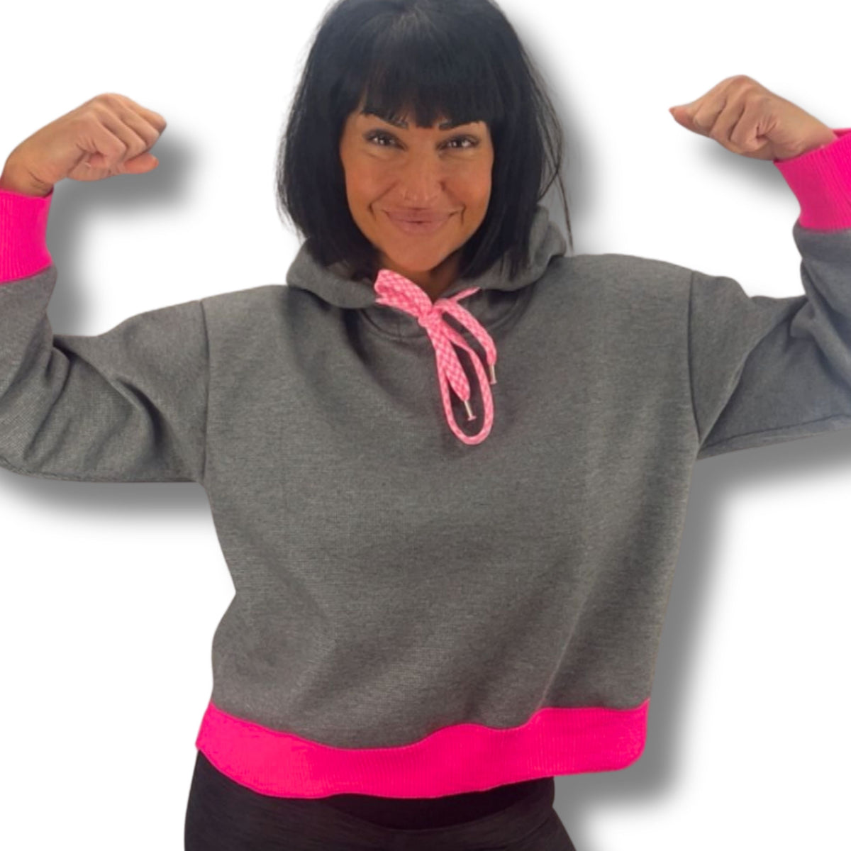 Hoodie mit Kapuze Detailansicht – pinke Akzente an Kordel und Nähten
